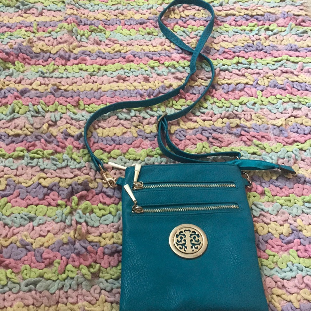 MULTIPURPOSE TURQUOISE CROSSBODY